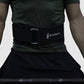 man using power lifting belt to left in squats and deadlifts