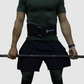 man using power lifting belt to left in squats and deadlifts